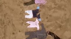 Thousands of Children's Outfits Laid Out Along UK Beach in Gaza War Protest