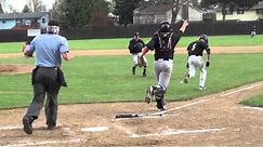 Pitch behind batter's head hits his bat and is throw out