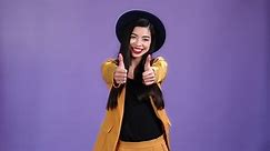 Lady promoter make thumb up ads isolated vibrant color background