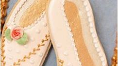 I was inspired to make these pointe shoe cookies after seeing a real-life pair of the prettiest pointe shoes in the window of @kingstoncandybar! They're decorated with royal icing and @sweetsticksau edible paint. #royalicingart #royalicingcookies #icingcookies #decoratedcookies | SweetAmbs