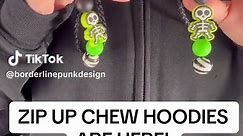 🦇🖤 Zip up chew hoodies with chewable hoodie strings (the silicone bits) are finally here!!! These hoodies are compatible with our chew charms! :D they are super soft and comfortable too. 🟢What is a chew hoodie? A chew hoodie is just a hoodie with special screws on the drawstrings that allow you to attach chew charms onto it! 🟢When is a chew charm? A chew charm is an attachment for your drawstring that is 100% food grade silicone and meant to be chewed on! This way instead of chewing on the e