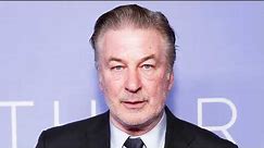 Alec Baldwin hits camera away from performance artist confronting him over Rust shooting #news