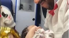 Gaza emergency worker breaks down in tears while cradling baby #shorts