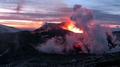 Volcanic Eruption in Iceland 2010 in Eyjafjallajokull. Footage taken in extreme conditions only a half mile from the crater during frequent gas explosions from advancing lava. A mountain is born.