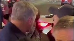 Alec Baldwin argues with protesters, escorted away by police