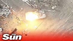 Ukrainian drones drop explosives into Russian IFV's open hatch and blow it up