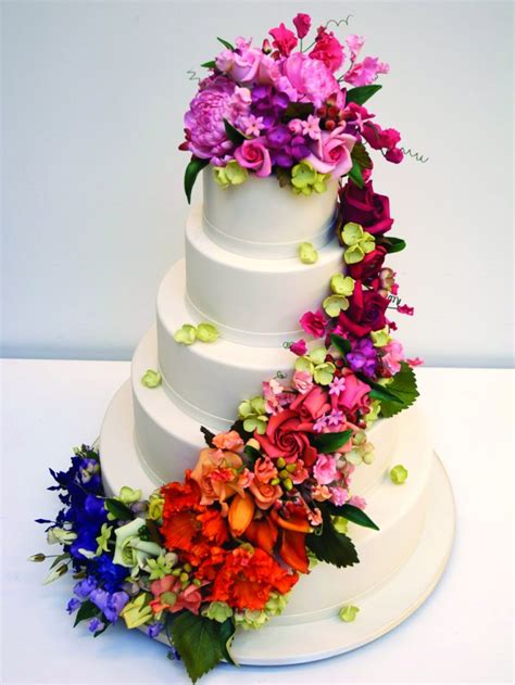 25 delightful wedding cakes with cascading florals onewed