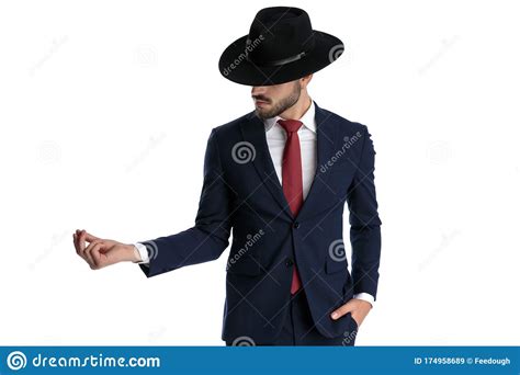 mysterious man snapping  fingers  hand   pocket stock image