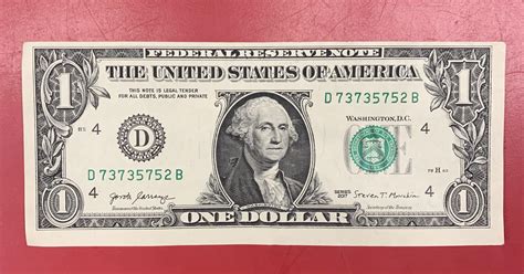 misaligned  dollar bill rpapermoney