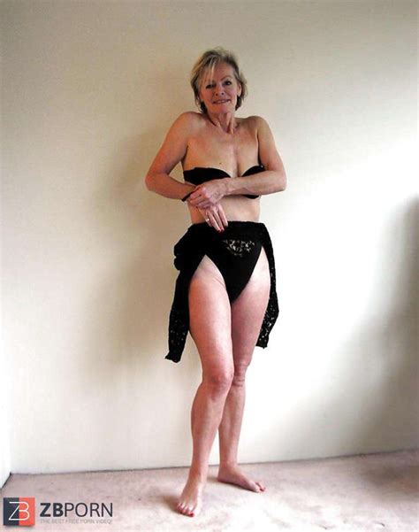 justine a mature blondie posing in a ebony bondage suit zb porn