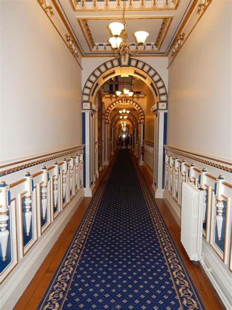 cool long hallway  harlaxton manor regency house hall house