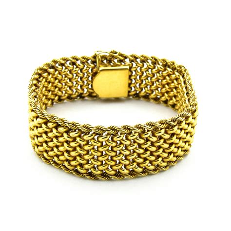 yellow gold  grams woven style wide bracelet property room