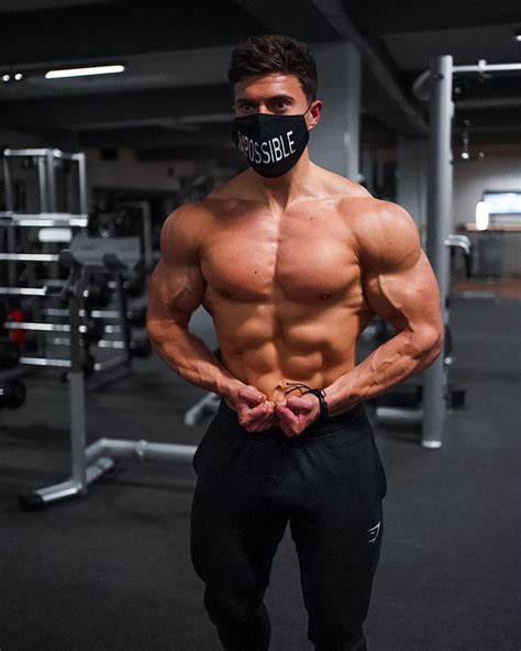 impossible face mask shirtless muscle gym male hunk biceps pecs flex