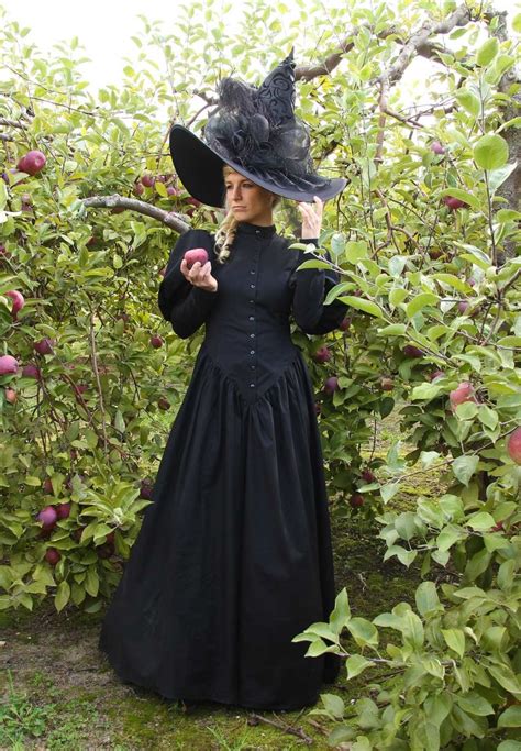 victorian witch dress and glamorous witch hat witch