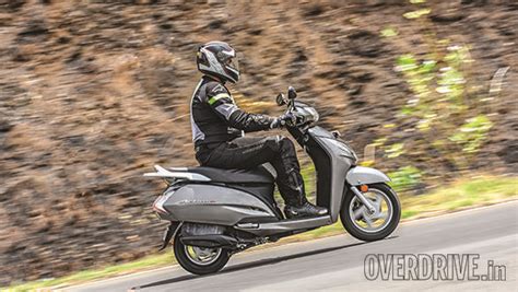 comparo suzuki access   mahindra gusto   honda