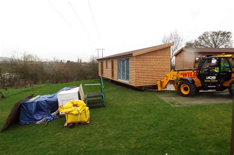 log cabin mobile home delivered
