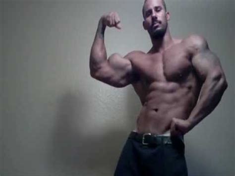 muscle god samson flexing  huge biceps flex bodybuilder