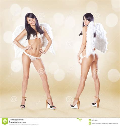 two cute women angels standing with white wings and lingerie over beige