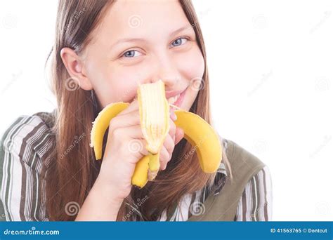 teen girl eating banana stock image image of natural 41563765