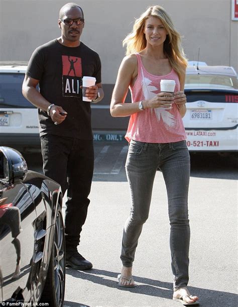 Eddie Murphy Gives A Thumb Up As He Takes His Pretty Blonde Girlfriend