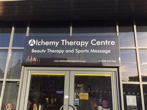 entrance   alchemy therapy centre  glass doors  signage