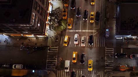 simulated drone aerial view   busy manhattan street  night