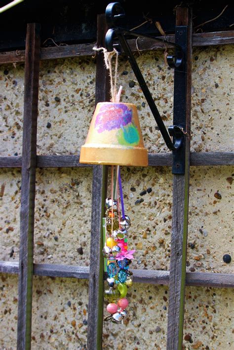 lamp    top   wooden pole  beads hanging   sides