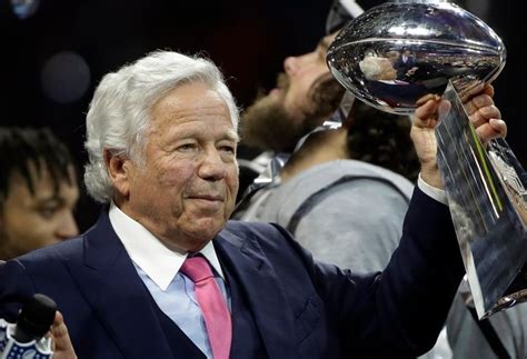 patriots owner robert kraft charged with soliciting sex in