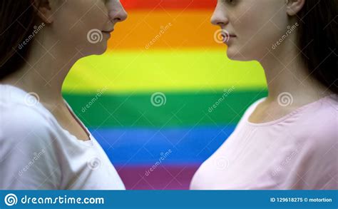 Lesbian Couple Against Rainbow Flag Background Same Sex