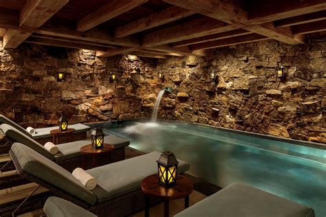 indoor pool  stone walls  lounge chairs interior design games