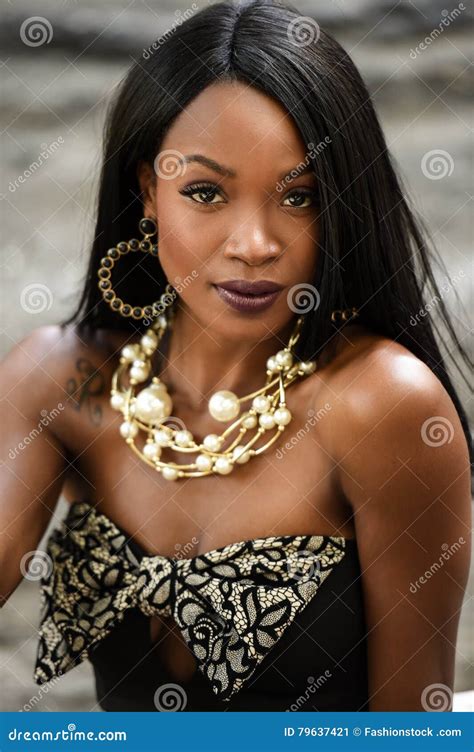 exotic  african american woman posing  front  camera stock