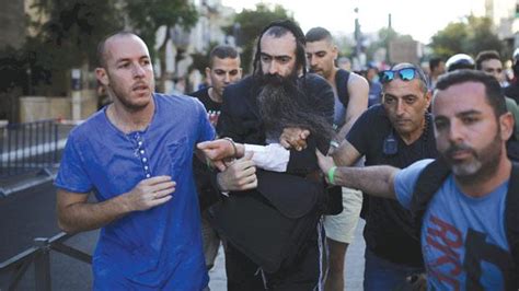 assailant attacks jerusalem gay parade