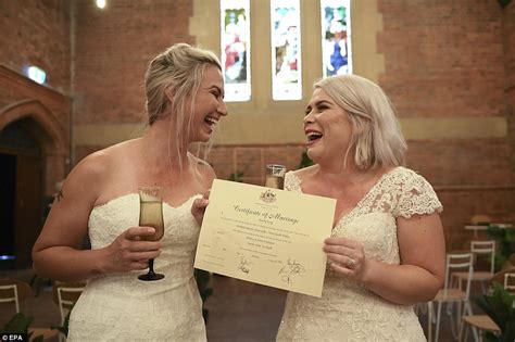 australian same sex couples marry in midnight ceremonies