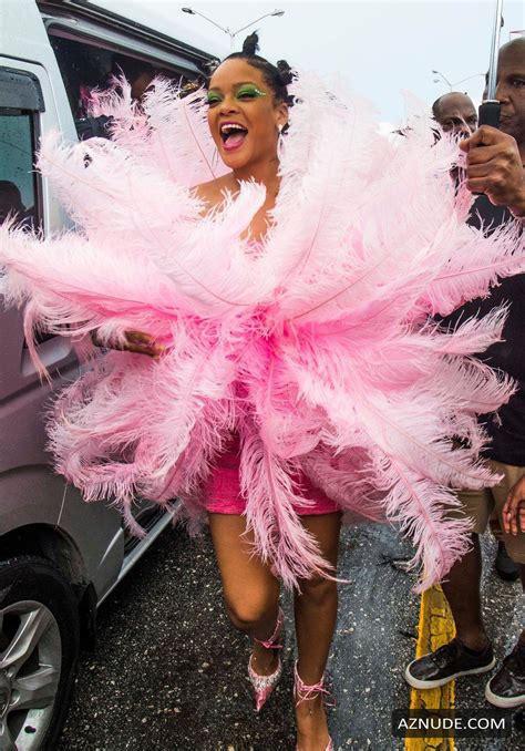 rihanna sexy in a pink dress during kadooment day parade in st