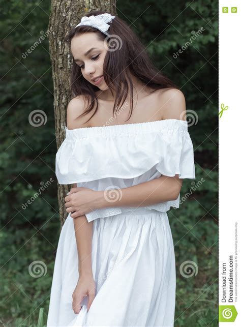Beautiful Sweet Girl With Dark Hair In A White Sundress