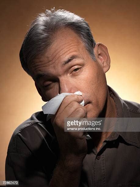 Wiping Nose On Shirt Photos And Premium High Res Pictures Getty Images