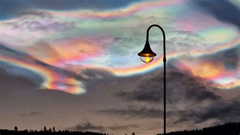 extremely rare rainbow clouds light  arctic skies   days