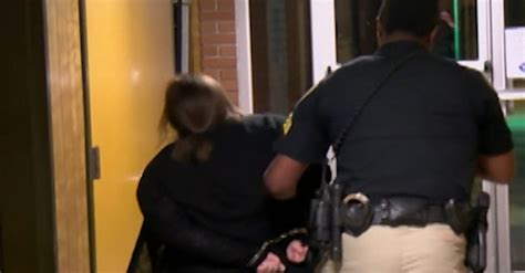 teacher arrested at school board meeting after questioning