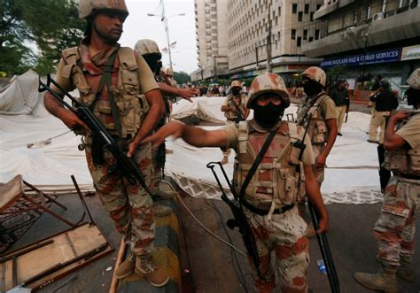 pakistan  dead  injured  clashes  karachi party storms