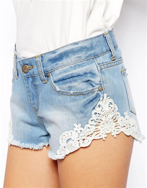 Asos Low Rise Denim Shorts With Lace Trim In Blue Lyst