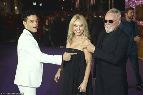 rami malek poses with queen s brian may and roger taylor at uk premiere of bohemian rhapsody