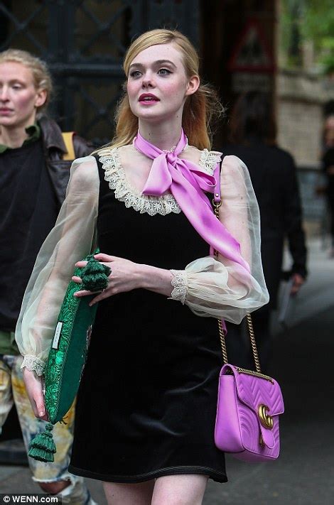 elle fanning looks regal as she attends gucci catwalk show at westminster abbey daily mail online
