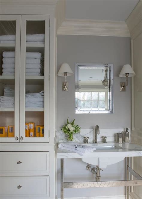 ivory  gray bathroom  glass door linen cabinet