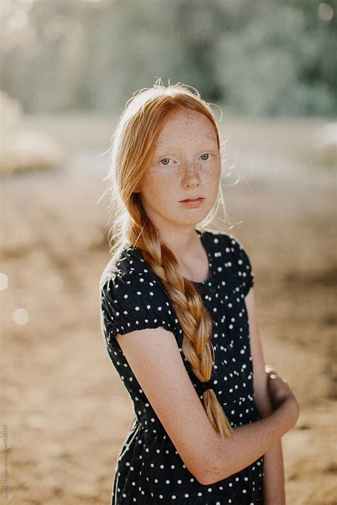 portrait of redhead girl by stocksy contributor sidney scheinberg