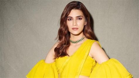 kriti sanon raises the experimental fashion bar in yellow saree with