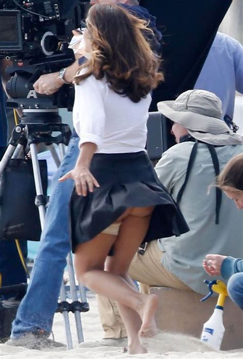 feeling cheeky salma hayek flashes her derriere as she films new movie