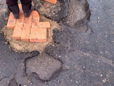 how russians repair holes in the road barnorama