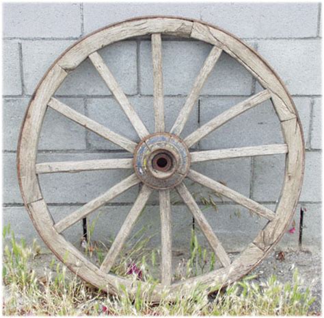 southwest country  turn   century authentic wooden yard wagon wheels