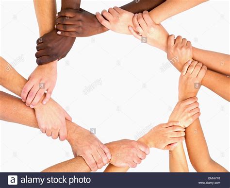 clasped hands   circle stock photo  alamy