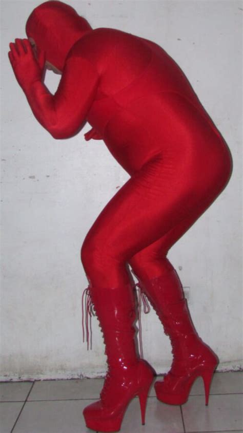 shiny red spandex lycra catsuit with red high heels boots fetish porn pic